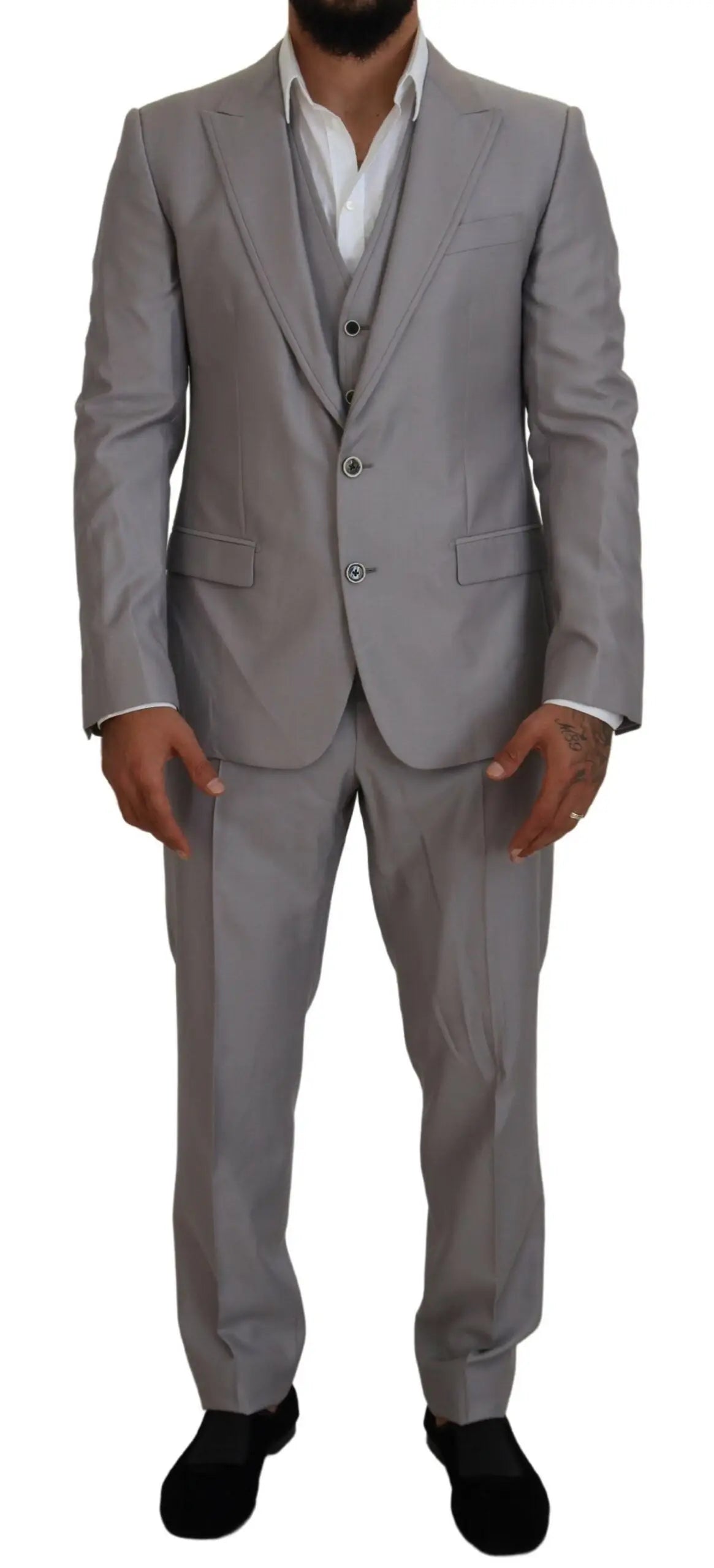 Une veste trois pièces slim fit en laine et soie gris clair avec une texture subtile de dolce & gabbana