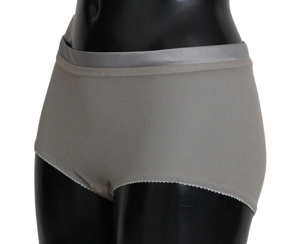 Culotte grise en maille dolce gabbana avec ceinture satinée et bas en soie filetée