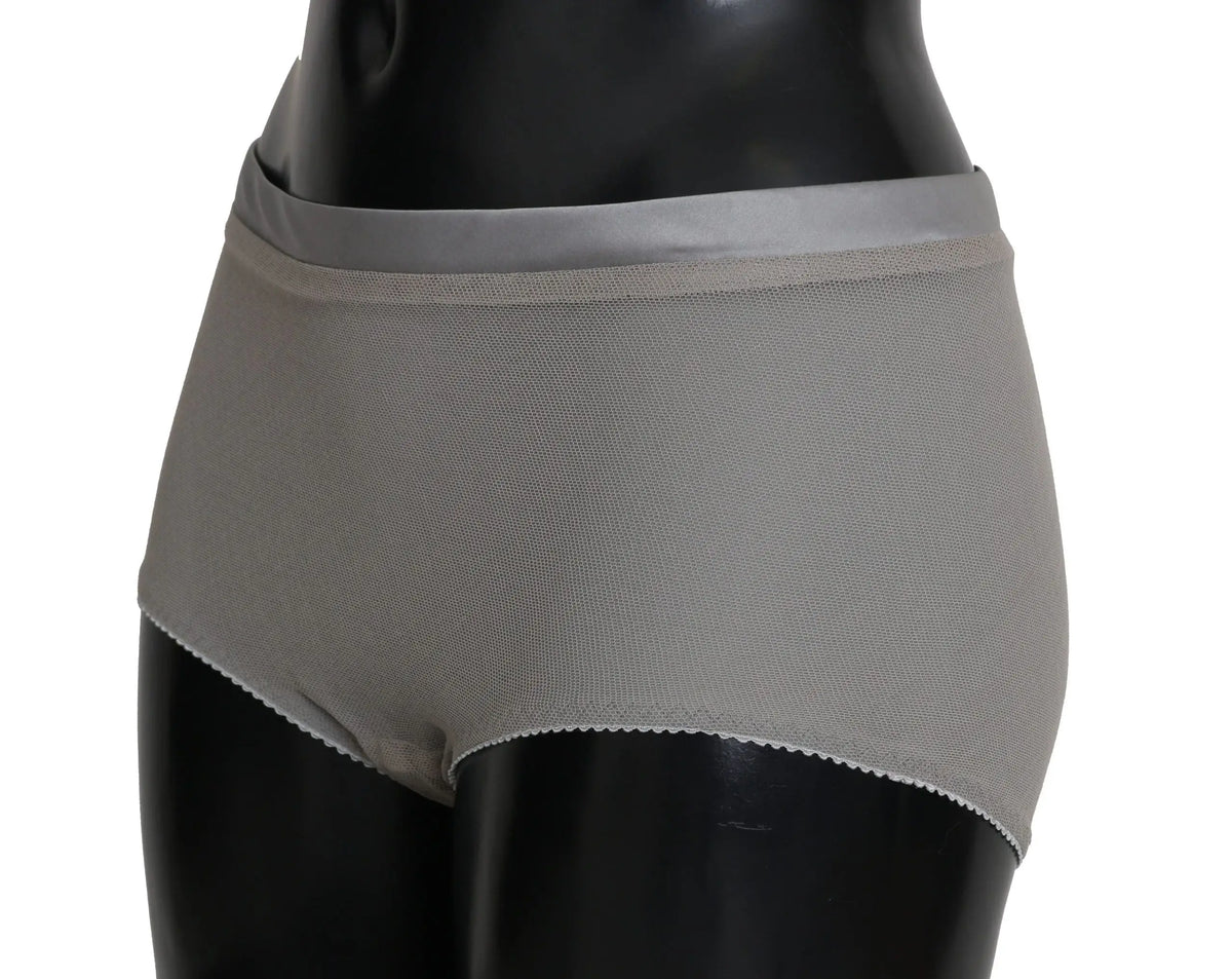 Culotte grise en maille dolce gabbana avec ceinture satinée et bas en soie filetée