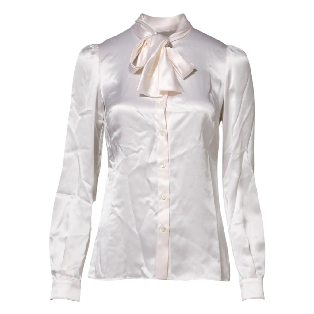 Blouse dolce & gabbana blanche en satin avec col ascot noué et manches longues à boutons sur le devant