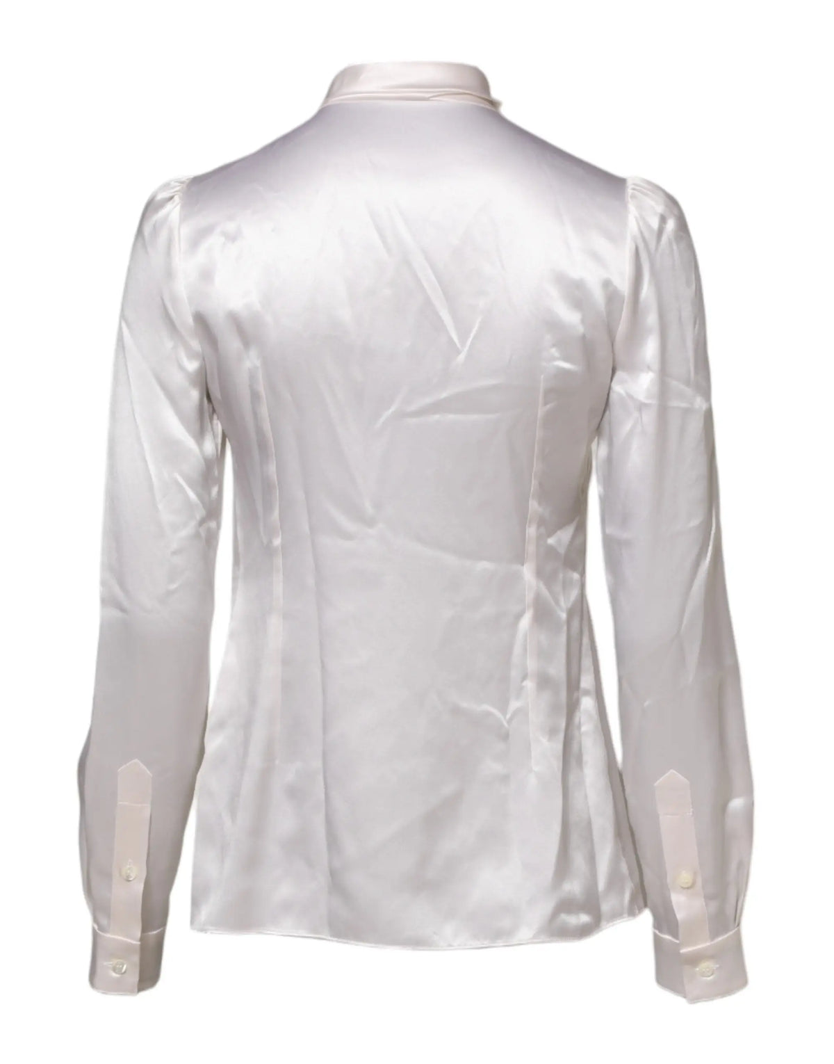 Une blouse blanche en satin à manches longues dolce & gabbana avec col ascot classique et poignets boutonnés
