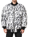 Veste bomber matelassée dolce and gabbana blanche avec logo noir graffiti et col, poignets et taille côtelés noirs