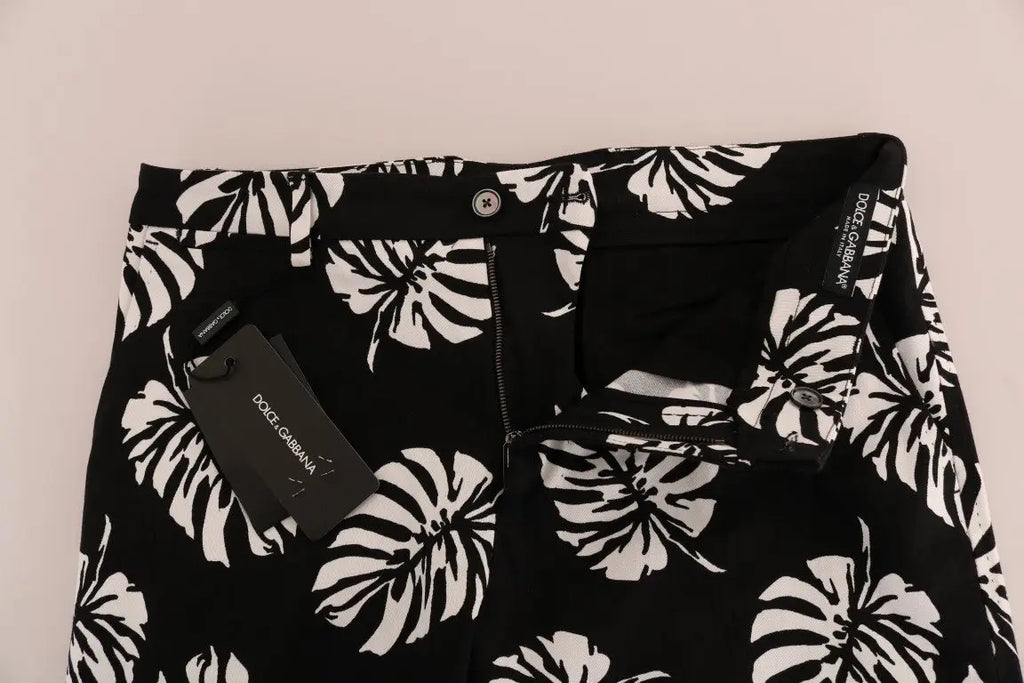 Pantalon slim en coton stretch blanc avec imprimé feuilles noires tropicales dolce gabbana