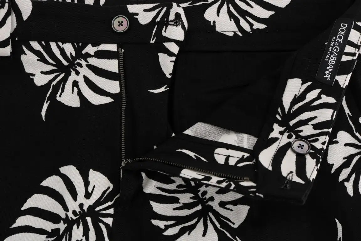 Pantalon slim en coton stretch noir dolce & gabbana avec imprimé feuilles tropicales blanches et boutons argentés