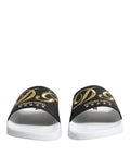 Dolce gabbana white black leather sandals with black slides gold dc logo luxury hotel text and white rubber sole
