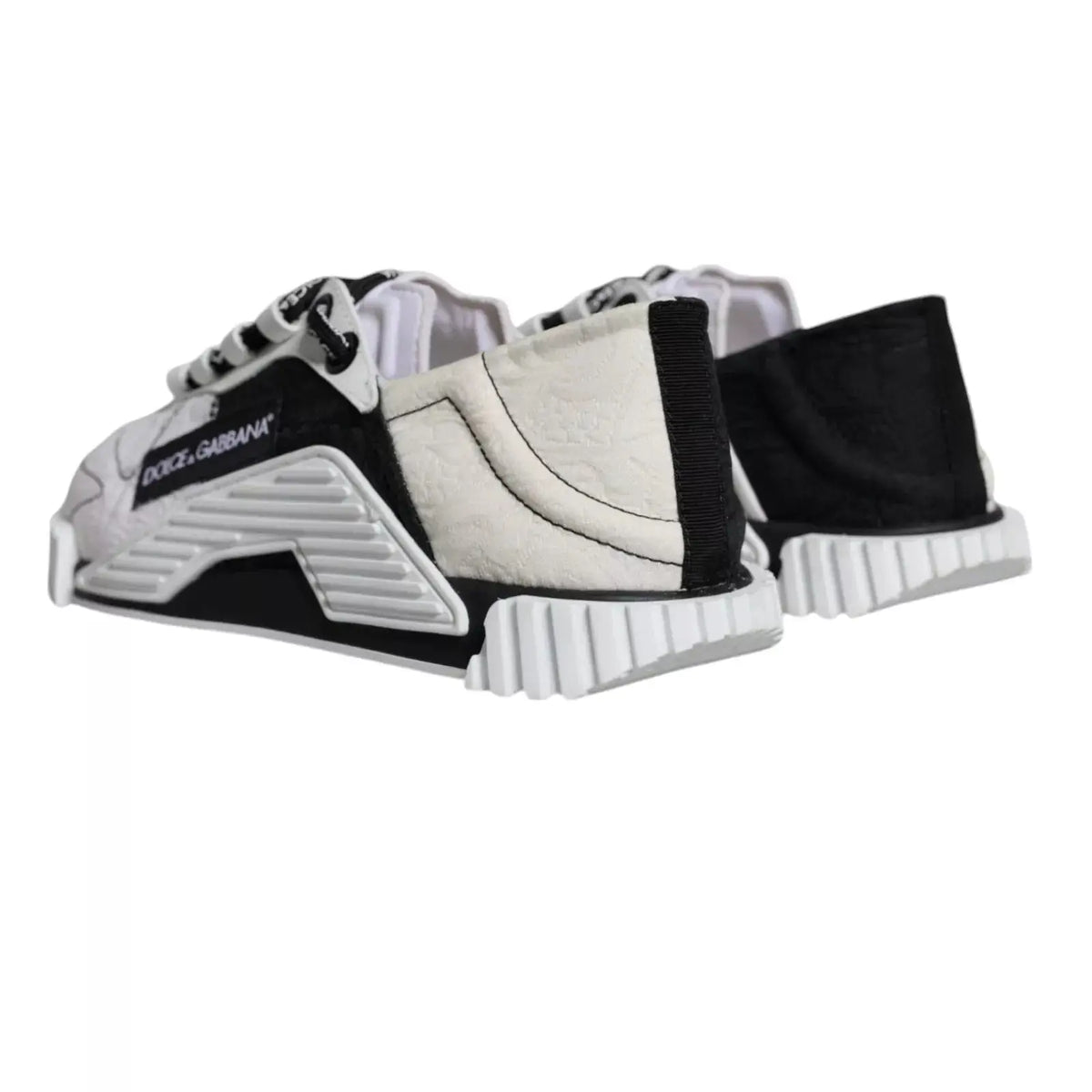 Baskets dolce & gabbana blanc et noir low top ns1 avec design angulaire audacieux et semelle épaisse texturée