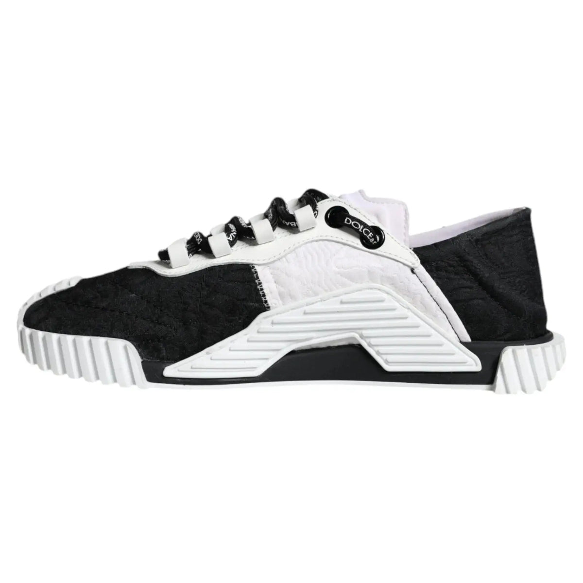 Sneakers dolce gabbana blanche et noire low top avec tige texturée semelle géométrique et lacets brandés