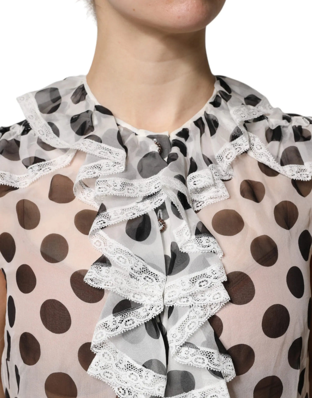 Blouse sheer blush pink with large brown and black polka dots and white lace ruffles at neckline by dolce & gabbana