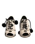 Dolce & gabbana bottines blanches à pois noirs avec ouverture peep toe et lacets à pompons