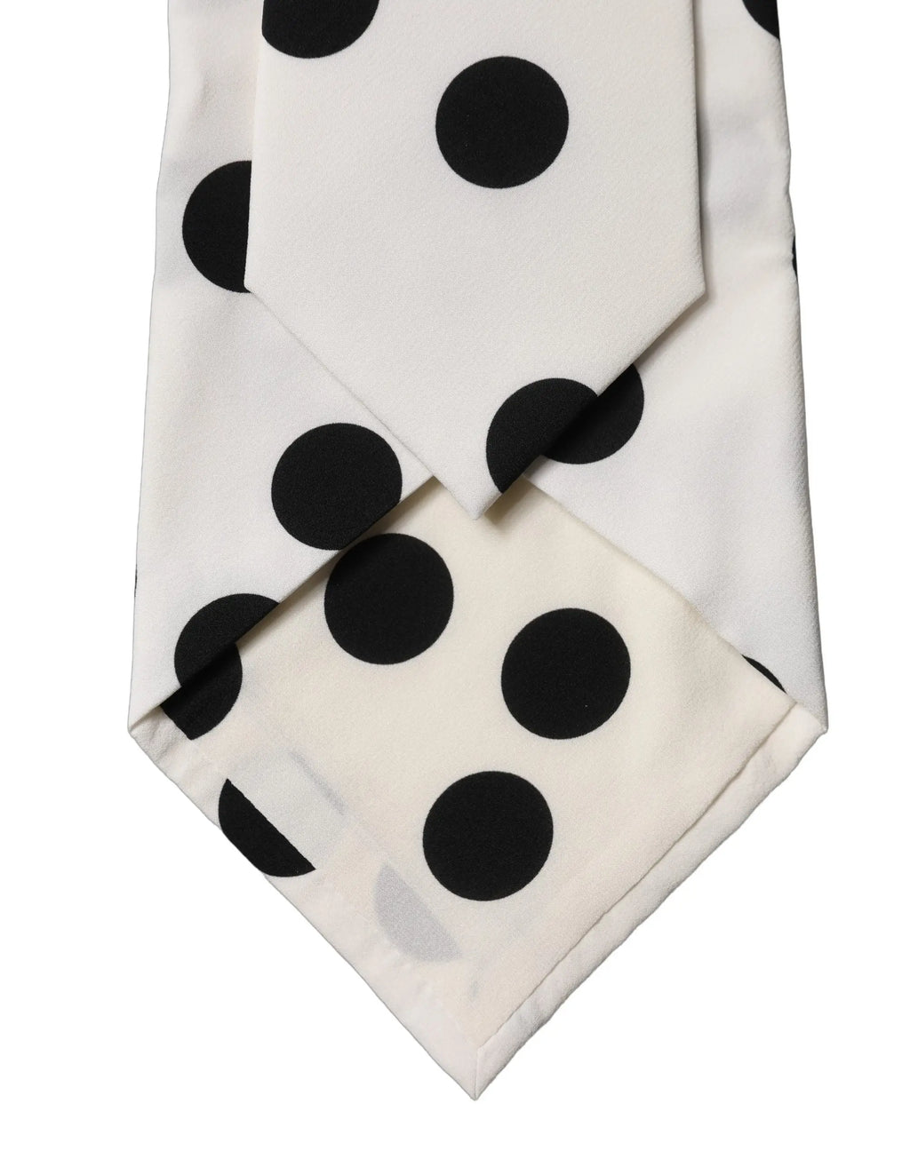 Une cravate pour femme ajustable en soie blanche dolce gabbana avec de gros pois noirs audacieux