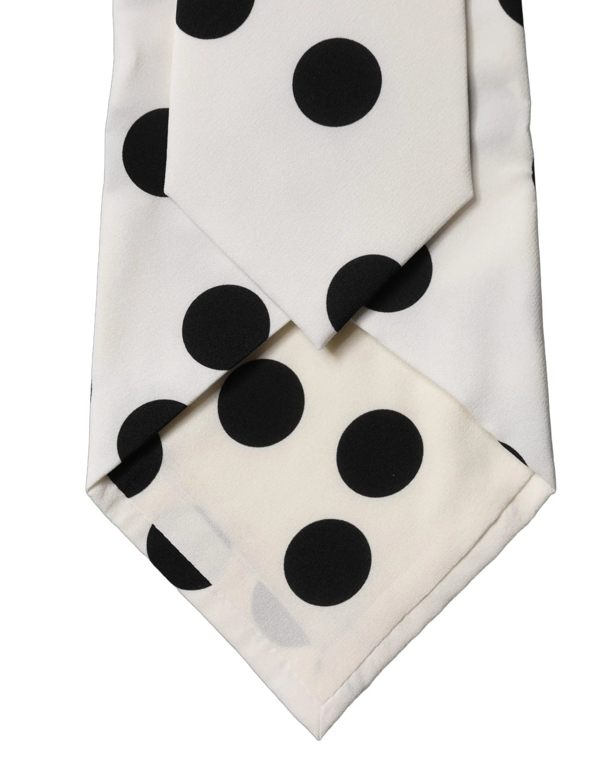 Une cravate pour femme ajustable en soie blanche dolce gabbana avec de gros pois noirs audacieux