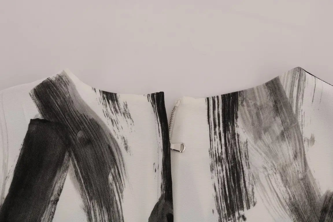 Veste blanche dolce & gabbana avec motifs noirs en coup de pinceau et fermeture éclair argentée