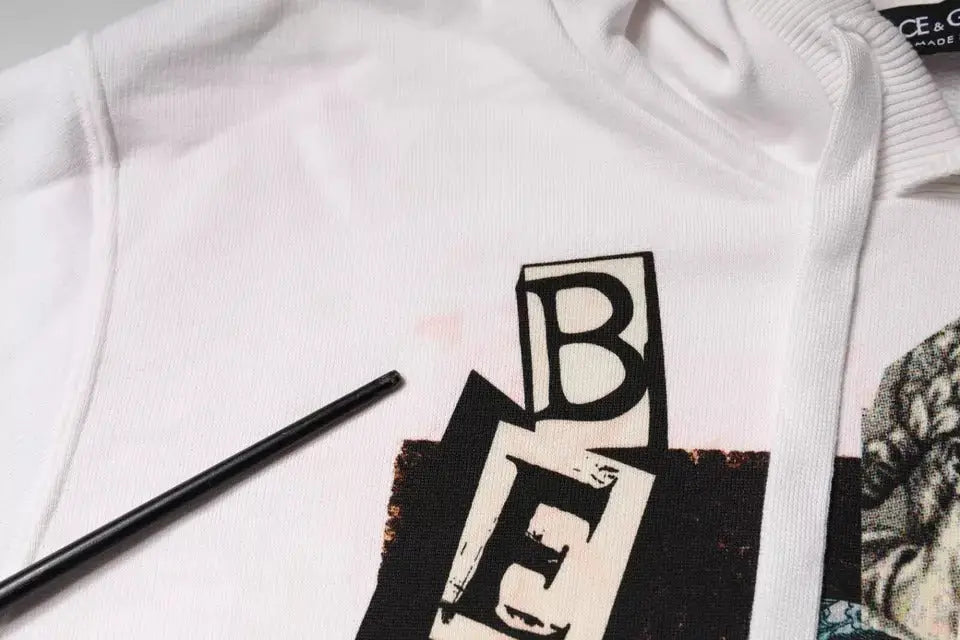 Dolce & gabbana sweat à capuche en coton blanc avec imprimé graphique noir et blanc audacieux et lettres stylisées