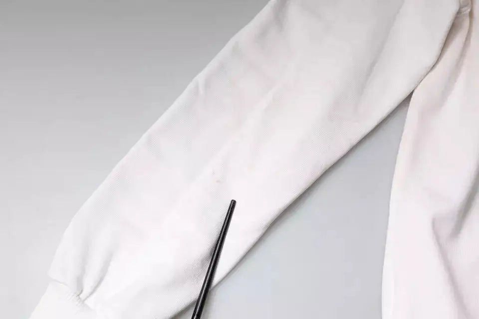 Manche en coton blanc avec poignet froncé subtil du pull à capuche dolce & gabbana blanc caesar