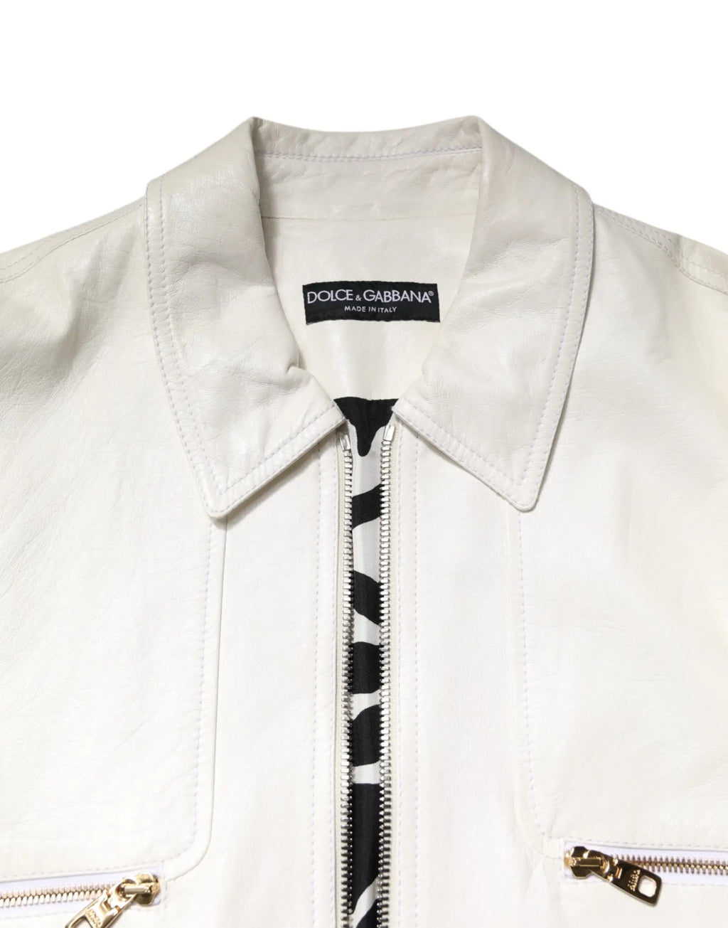 Veste biker blanche dolce & gabbana en cuir avec fermeture eclair dorée et tirette zébrée noire et blanche