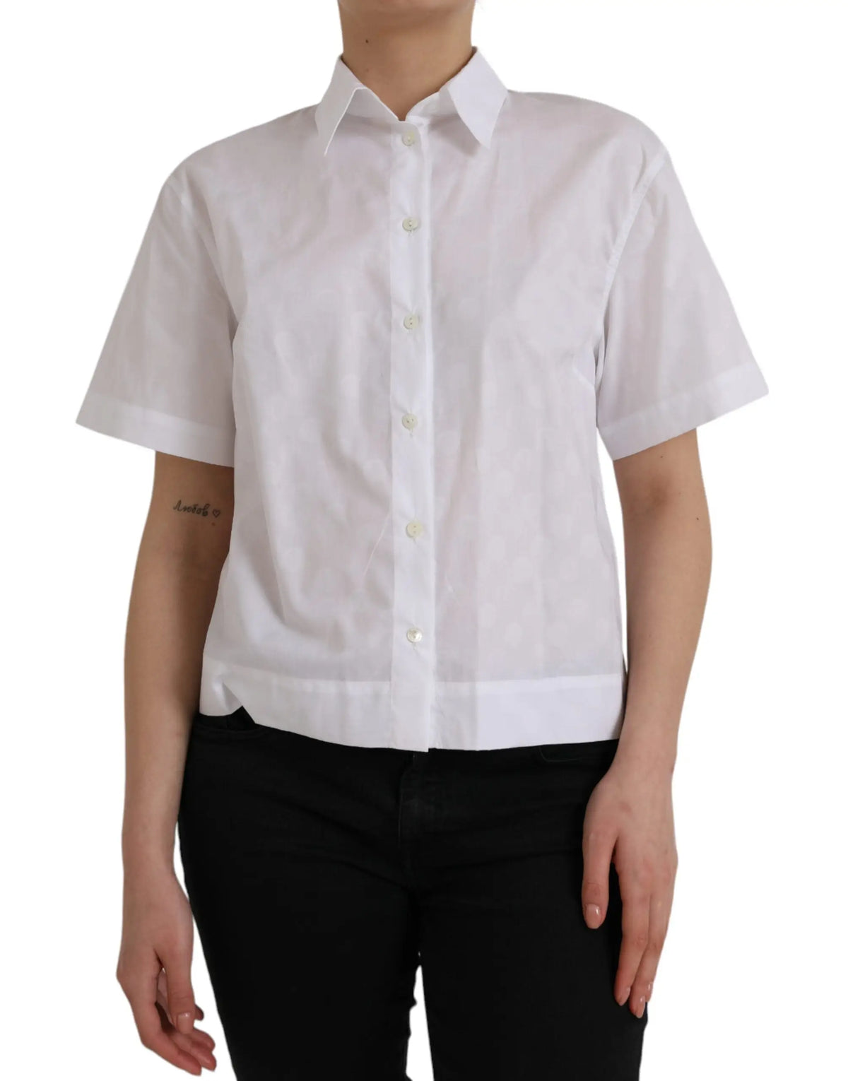 Chemise blanche dolce & gabbana à manches courtes avec col classique et tissu propre et net
