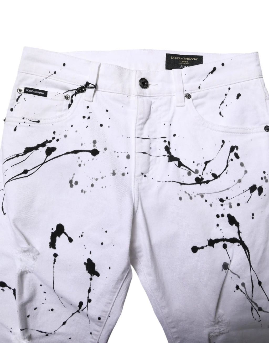 Short en jean skinny dolce & gabbana blanc avec motif éclaboussure de peinture noire audacieuse