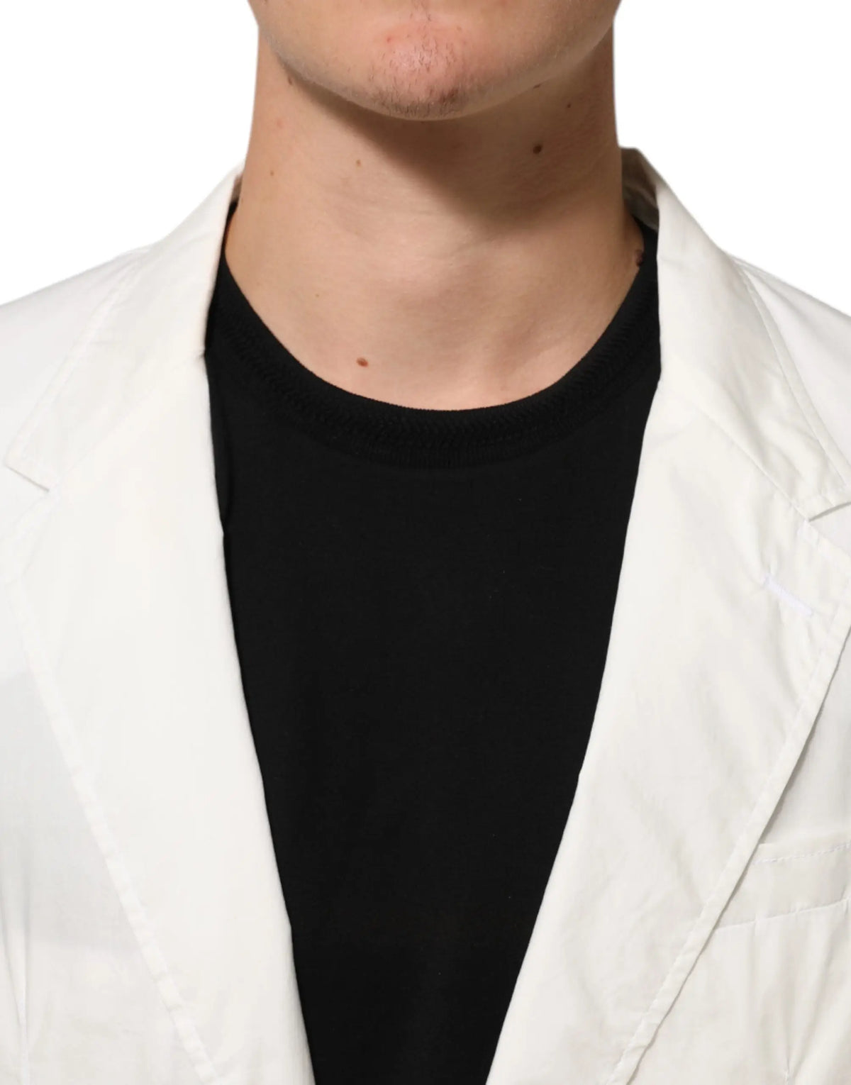 Blazer dolce & gabbana pour homme en coton blanc avec coupe ajustée et un bouton porté sur un t-shirt noir col rond