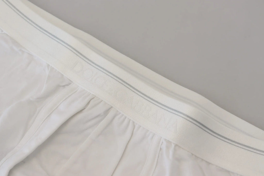 White ruffled bed skirt with subtle gray striped trim paired with dolce & gabbana white cotton blend regular boxer underwear