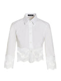 Blouse blanche dolce & gabbana en coton avec détails délicats en dentelle au bord et aux poignets