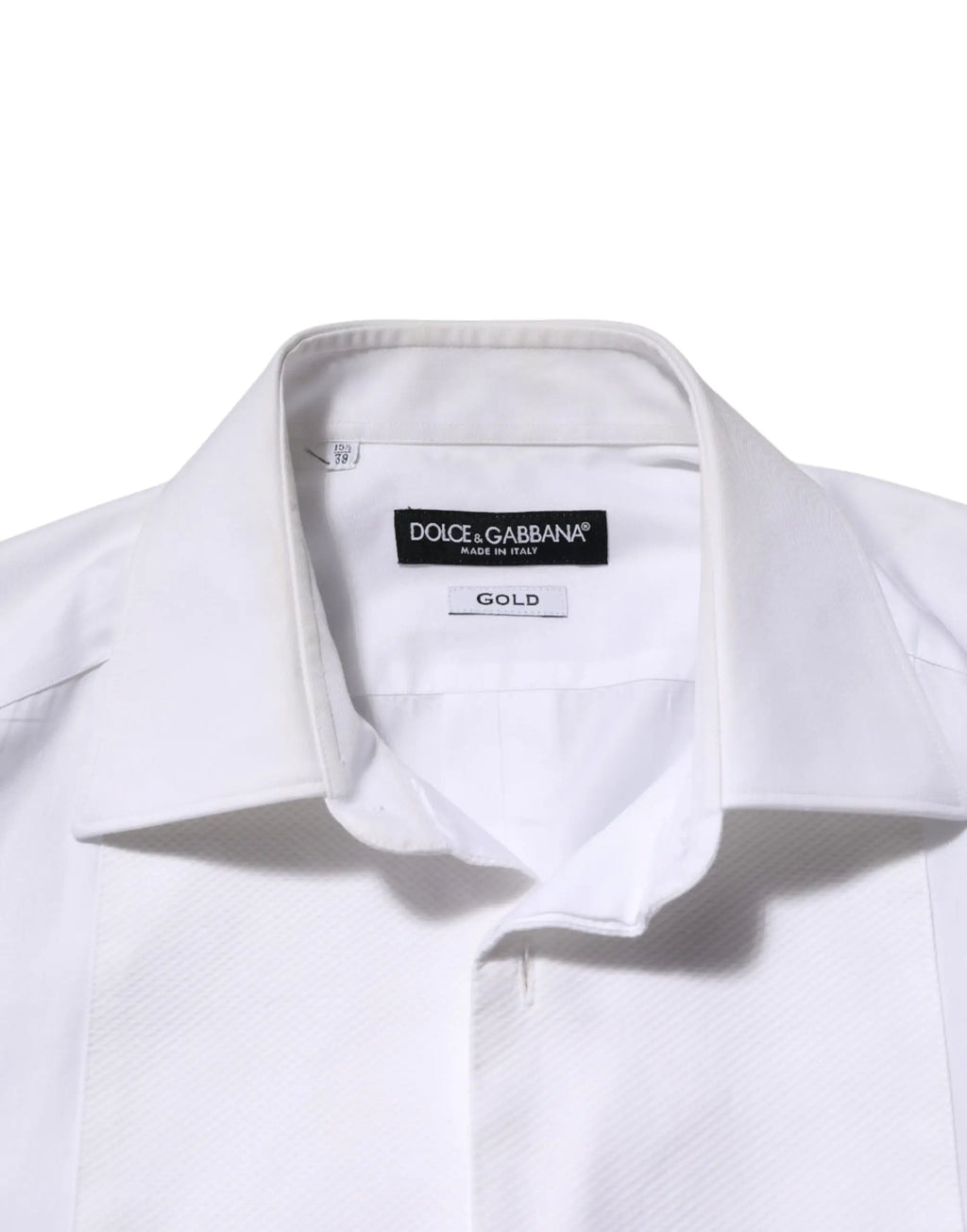 Chemise habillée blanche dolce & gabbana en coton avec col net et étiquette or indiquant le tissu