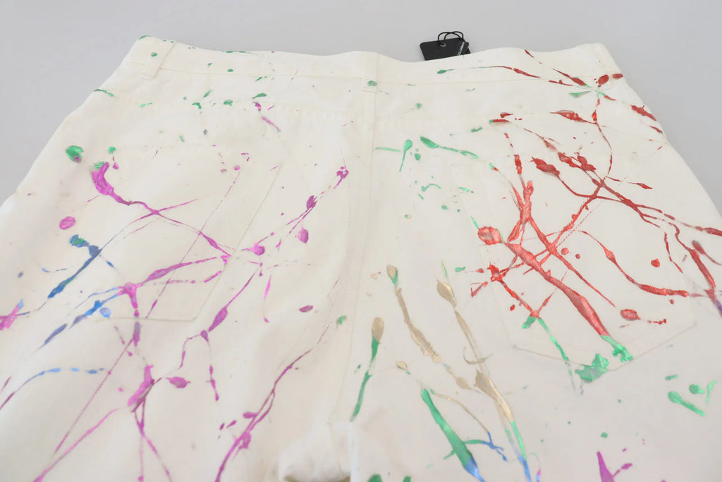 Dolce & gabbana pantalon en denim blanc coton avec éclaboussures de peinture multicolores rouge vert bleu et violet