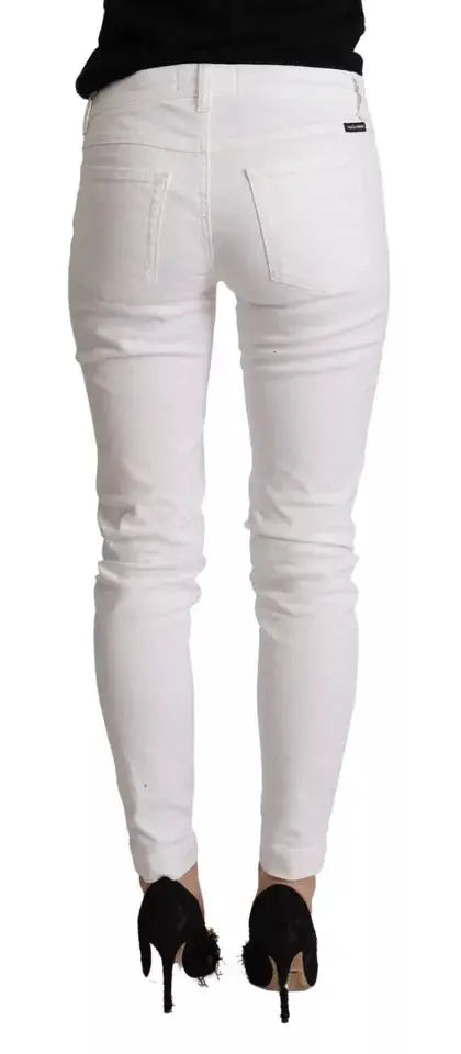 Jean slim blanc en denim de coton dolce & gabbana avec des détails subtils d usure