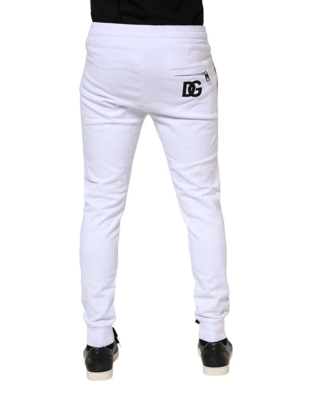 Vue arrière de joggers dolce & gabbana blancs en coton avec logo noir sur la poche arrière et cordon de serrage