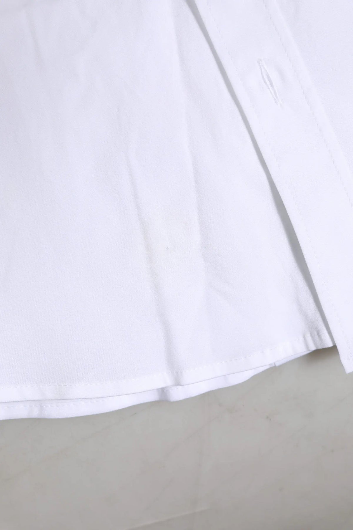 Chemise blanche en coton dolce gabbana avec manches longues et ourlet soigneusement cousu pour un look net