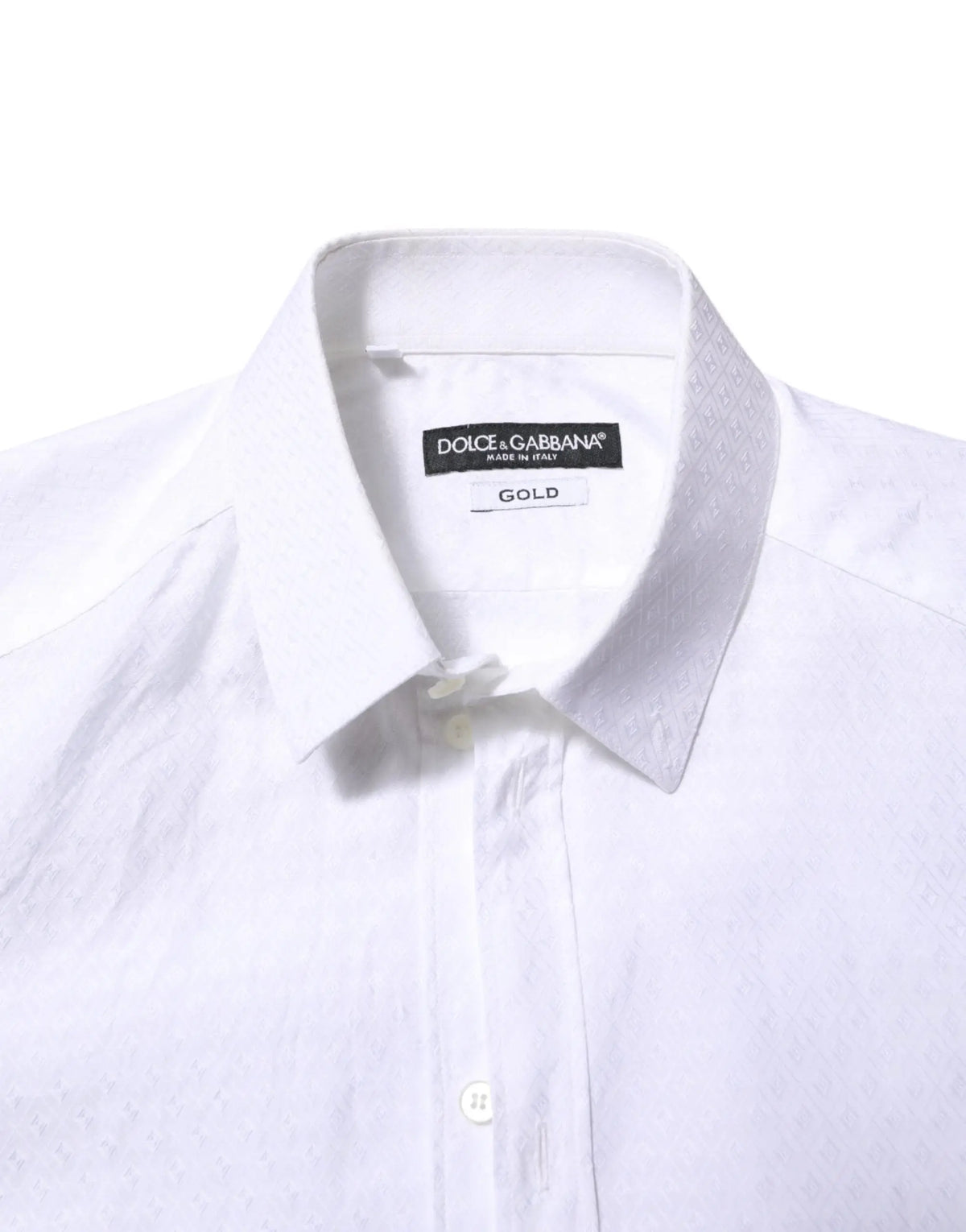 Chemise habillée blanche dolce et gabbana en coton avec col net texture subtile étiquette or fabriquée en italie
