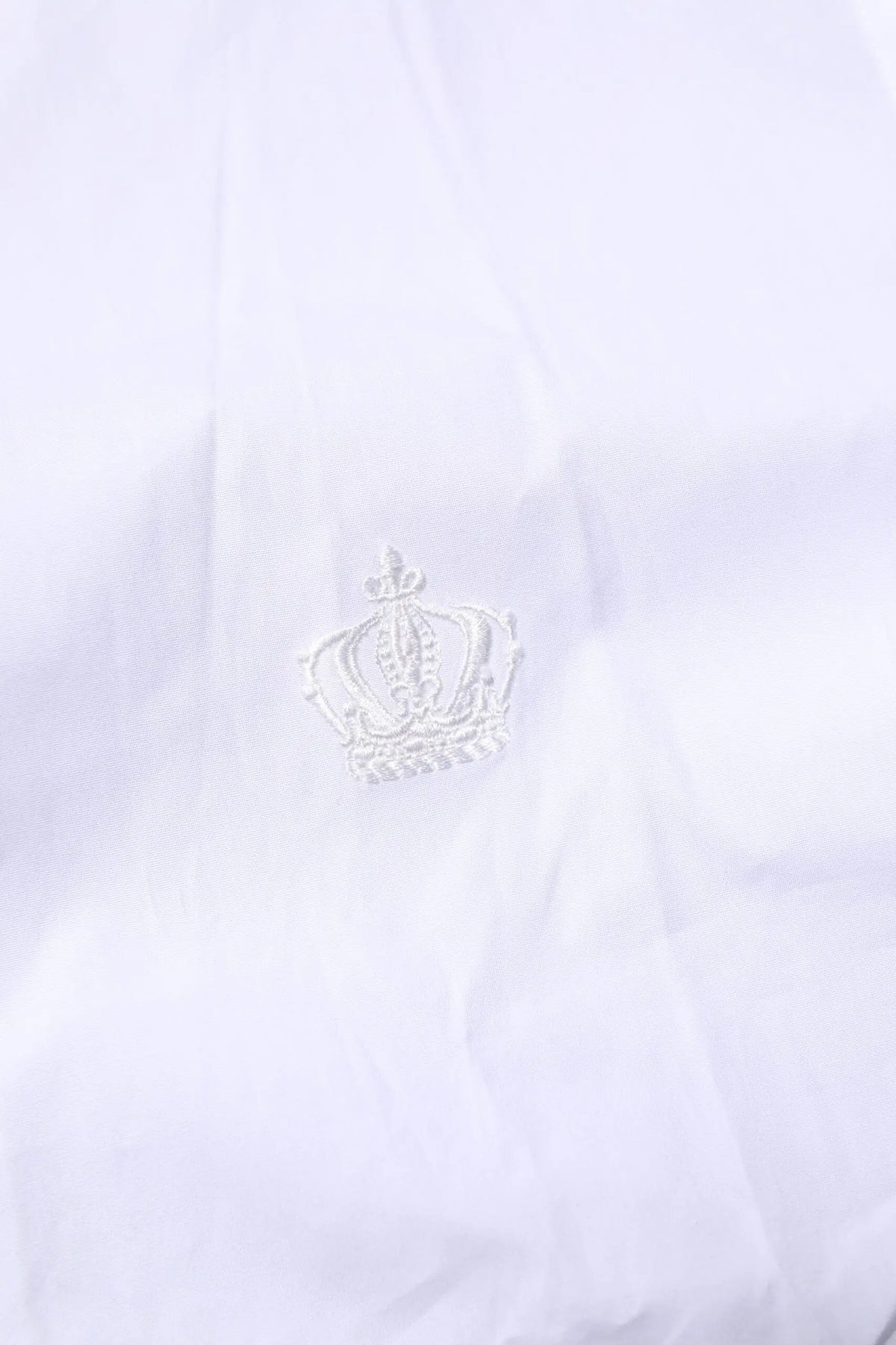 Chemise blanche en coton dolce & gabbana manches longues avec broderie argentée discrète couronne sur la poitrine