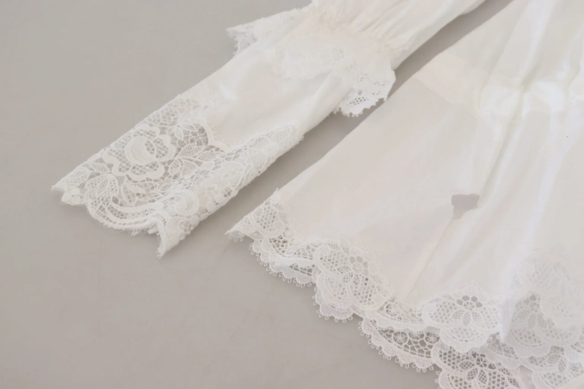 Blouse dolce et gabbana blanche en coton avec col roulé dentelle et motifs floraux délicats en tissu fluide