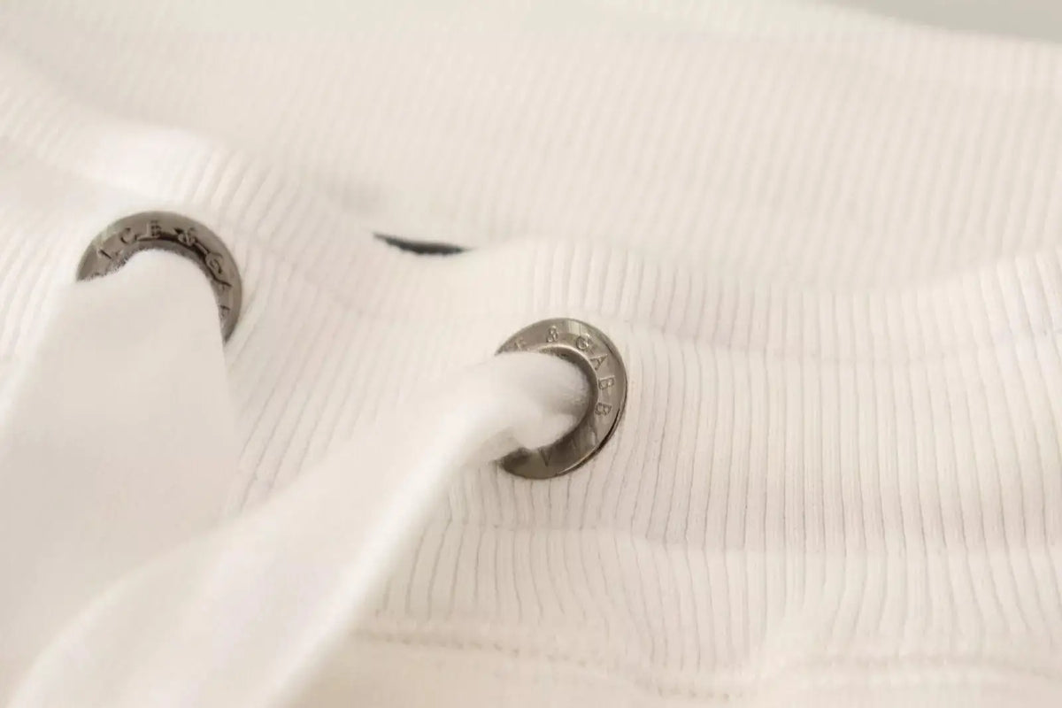 Cordon blanc côtelé avec œillets métalliques argentés gravés branding sur pantalon de jogging coton dolce gabbana