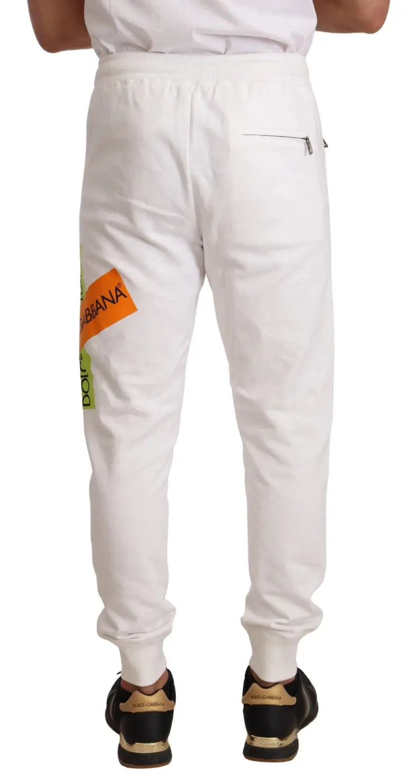 Pantalon de jogging blanc en coton dolce & gabbana avec patch logo orange et vert néon sur la cuisse gauche