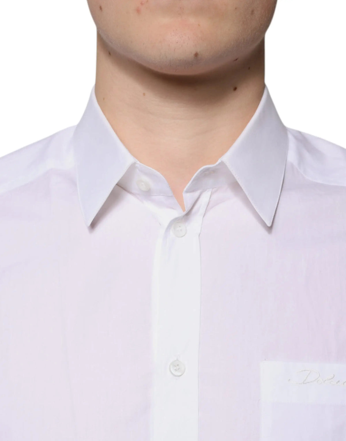 Chemise blanche dolce & gabbana en coton à manches longues avec col net et broderie discrète sur la poche poitrine