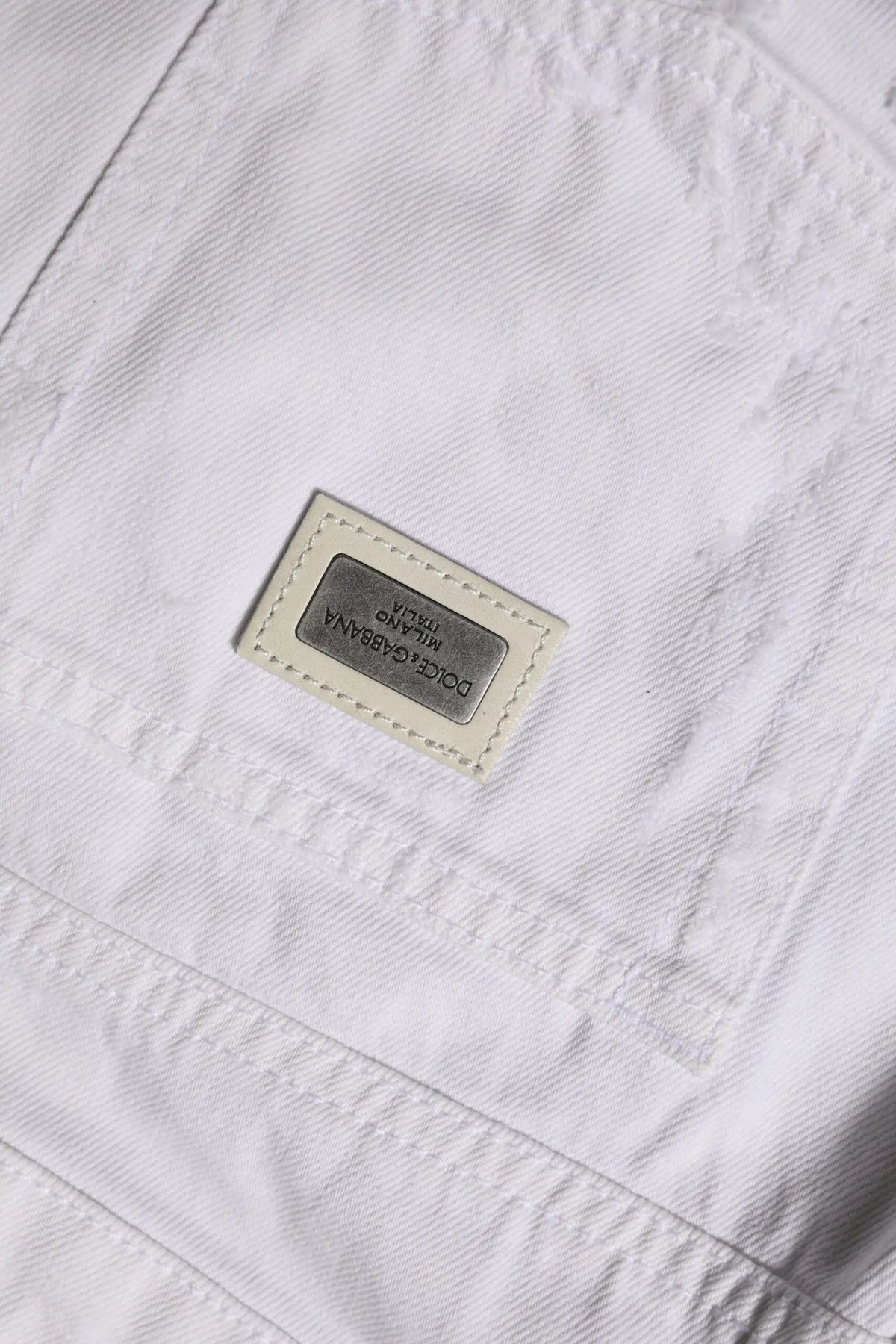 Jean femme dolce gabbana blanc en coton taille mi-haute avec patch cuir cousu logo milano au dos