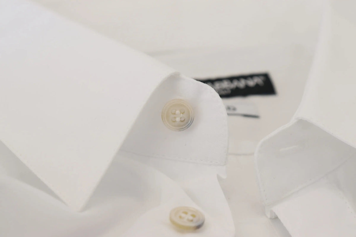 Chemise formelle dolce & gabbana en coton blanc avec col tailleur et boutons beige subtils