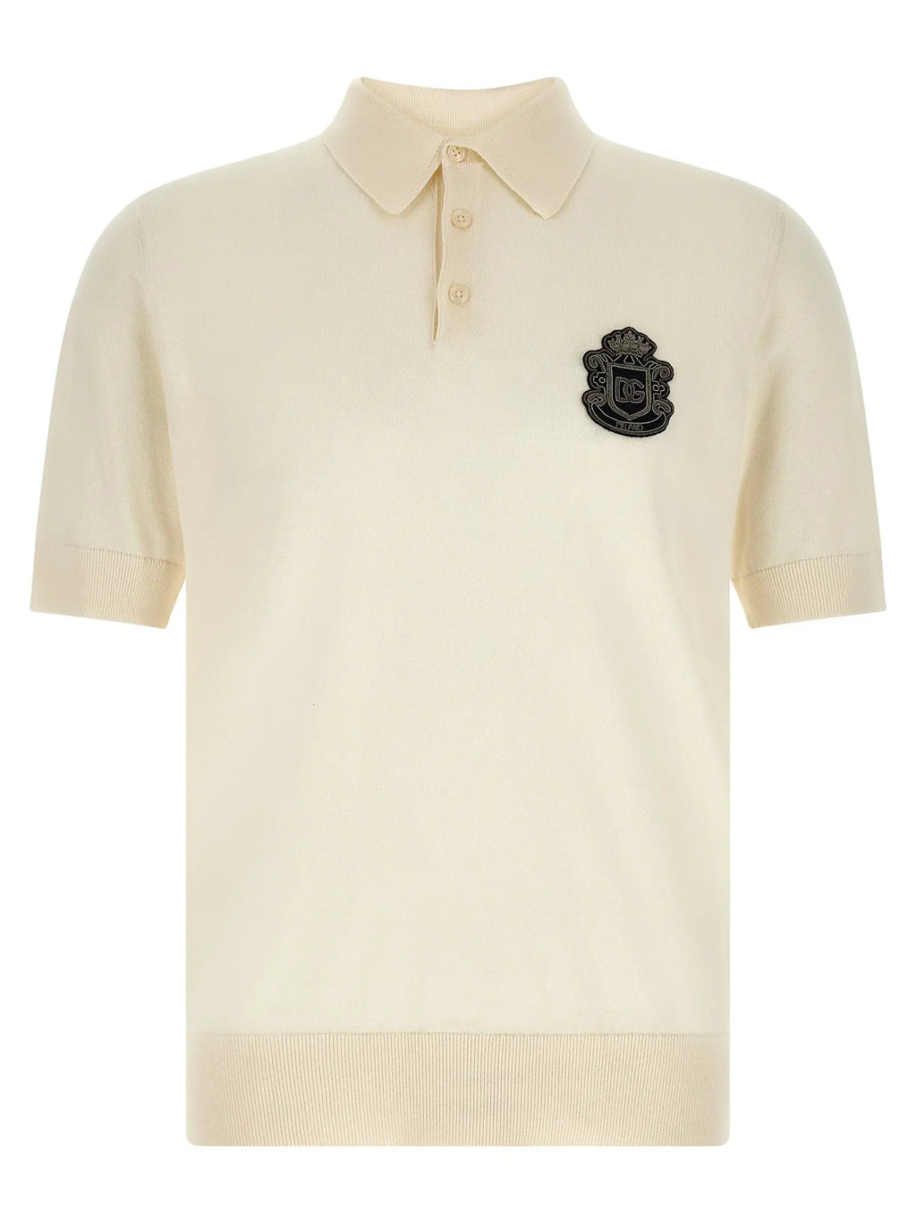 Polo en coton blanc dolce & gabbana avec broderie noire en forme d ecusson sur la poitrine gauche