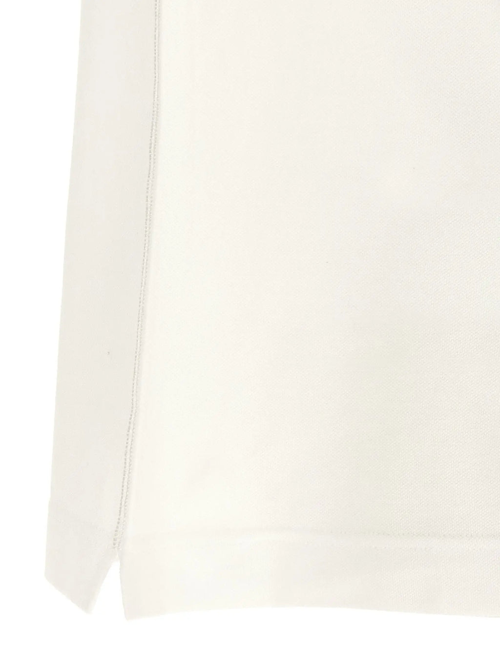 Jupe en coton couleur crème avec détail de couture subtile sur le côté pour chemise polo blanche dolce gabbana