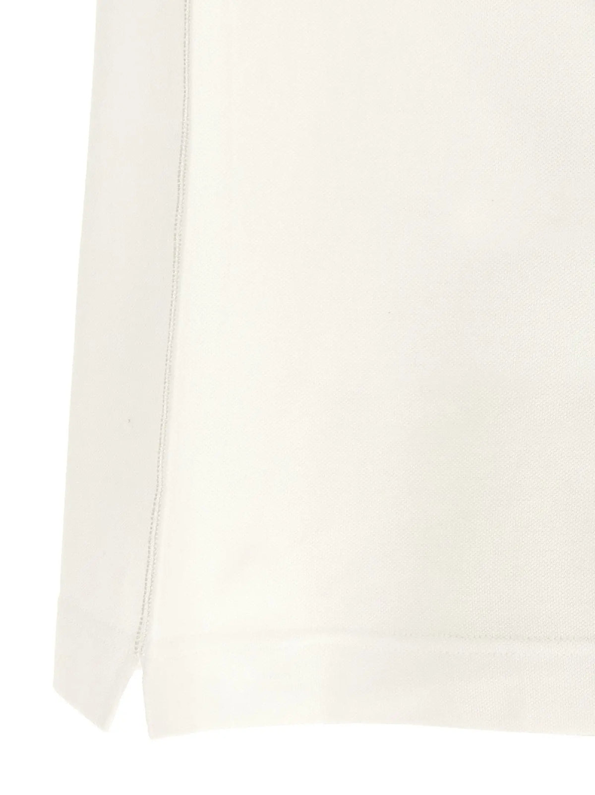 Jupe en coton couleur crème avec détail de couture subtile sur le côté pour chemise polo blanche dolce gabbana