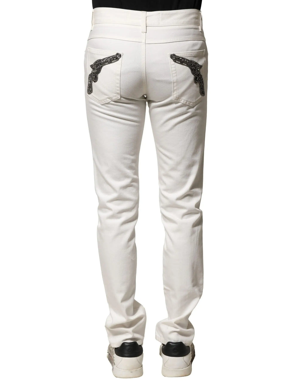 Jeans skinny homme en denim coton blanc dolce & gabbana vue dos avec embellissements noirs en forme de pistolet