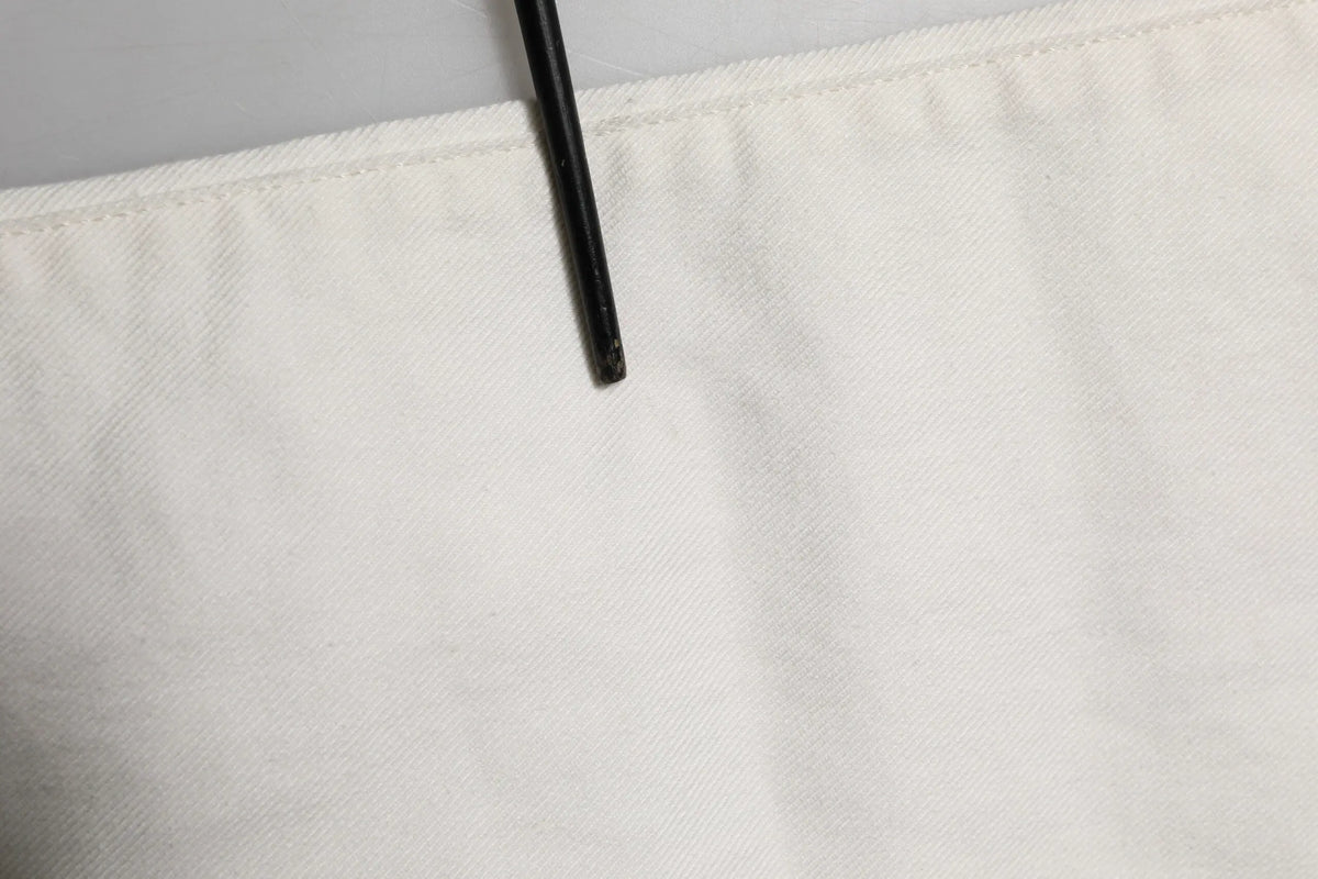 Jean skinny pour homme dolce & gabbana en coton blanc avec tissu texturé et clip noir sur le bord supérieur