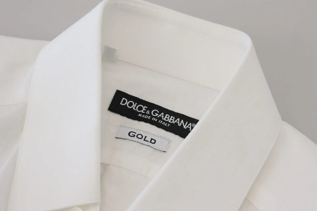 Chemise blanche dolce gabbana homme en coton slim fit avec col net et étiquette or indiquant la qualité du tissu
