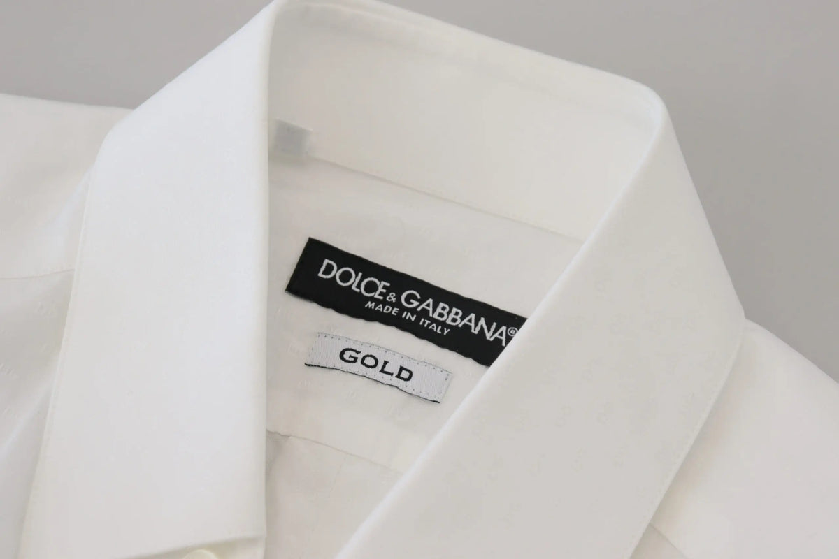 Chemise blanche dolce gabbana homme en coton slim fit avec col net et étiquette or indiquant la qualité du tissu