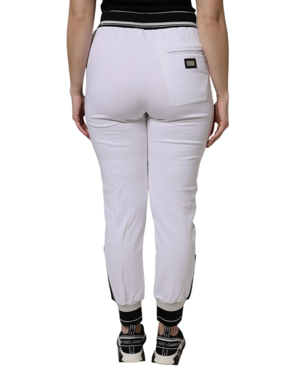Pantalon jogger blanc dolce & gabbana en coton stretch avec ceinture et poignets noirs rayés vu de dos