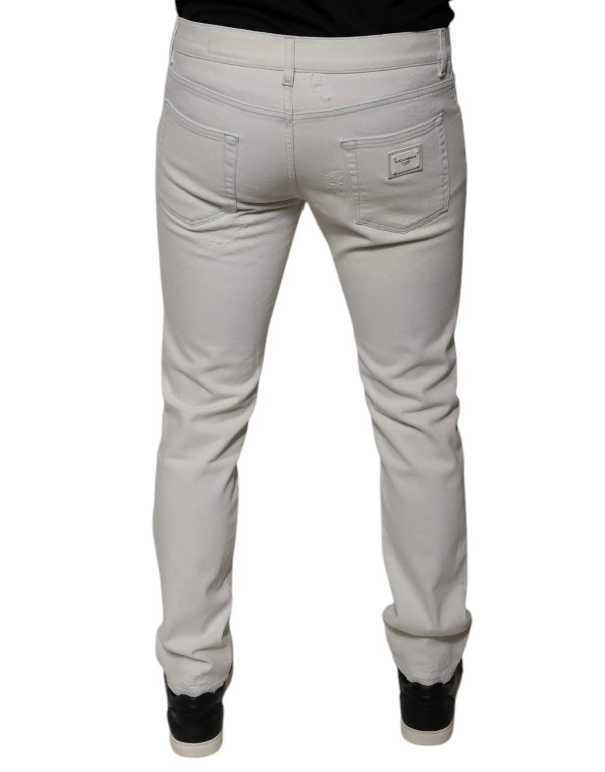Jeans en denim skinny blanc en coton extensible dolce & gabbana coupe slim vue arrière avec patch marque gris clair
