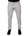 Jean slim fit en denim stretch coton blanc dolce gabbana pour homme avec cinq poches et légère décoloration