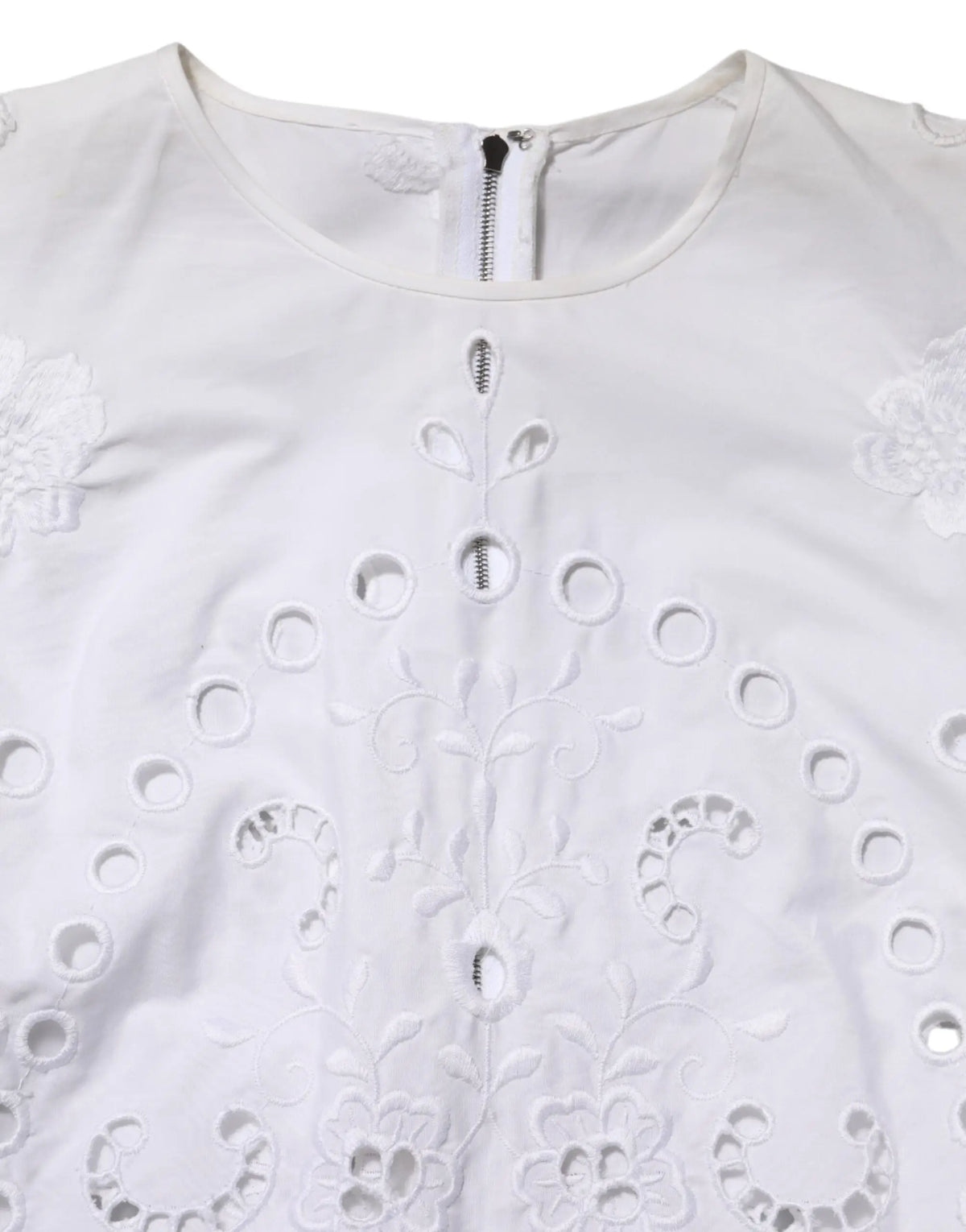 Dolce & gabbana robe mini blanche en ligne douce avec broderie florale délicate et motifs ajourés circulaires