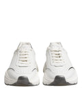 Baskets basses dolce & gabbana daymaster en cuir blanc avec semelle épaisse et accents gris subtils sur la pointe