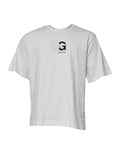 T-shirt blanc en coton dolce gabbana avec logo dg noir et texte dg 00 00 84 imprimé sur la poitrine